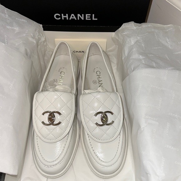 CHANEL Shoes - NWT Chanel Leather White Quilted Tab Silver Turnlock CC Logo Flats Loafers 37.5